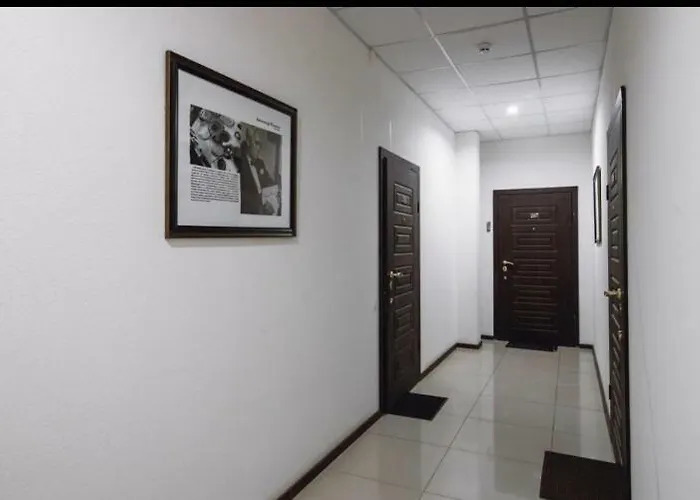 спальня-студия с видом на море и парк Апартаменти